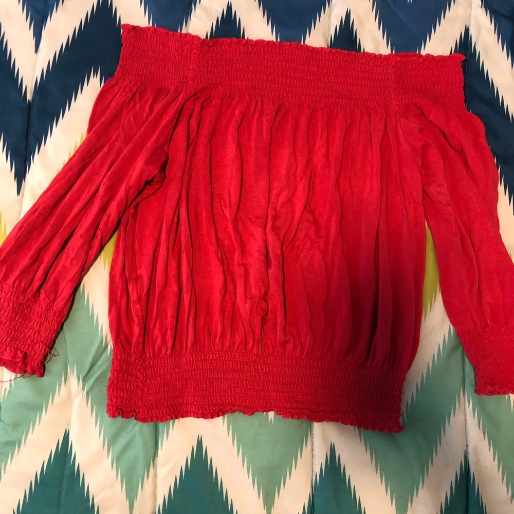 Off the shoulder hot pink top.